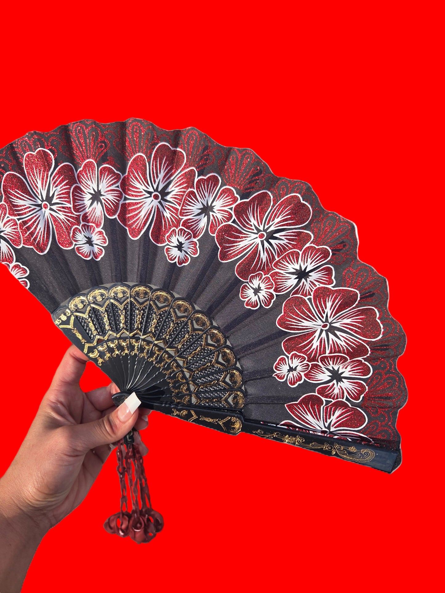 Beautiful hand held fan with glitter designs
